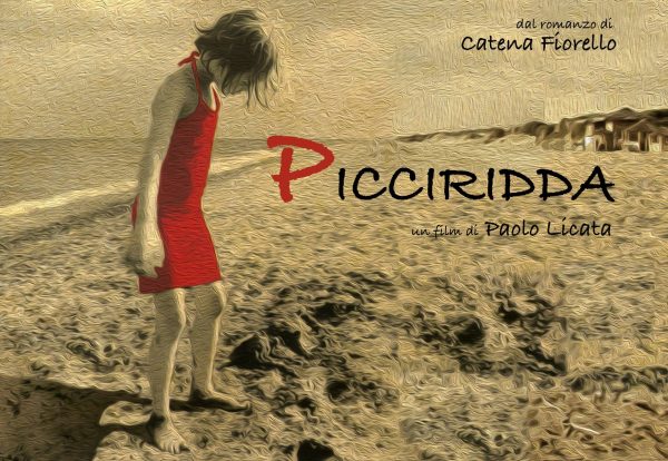 Picciridda-con-i-piedi-sulla-sabbia